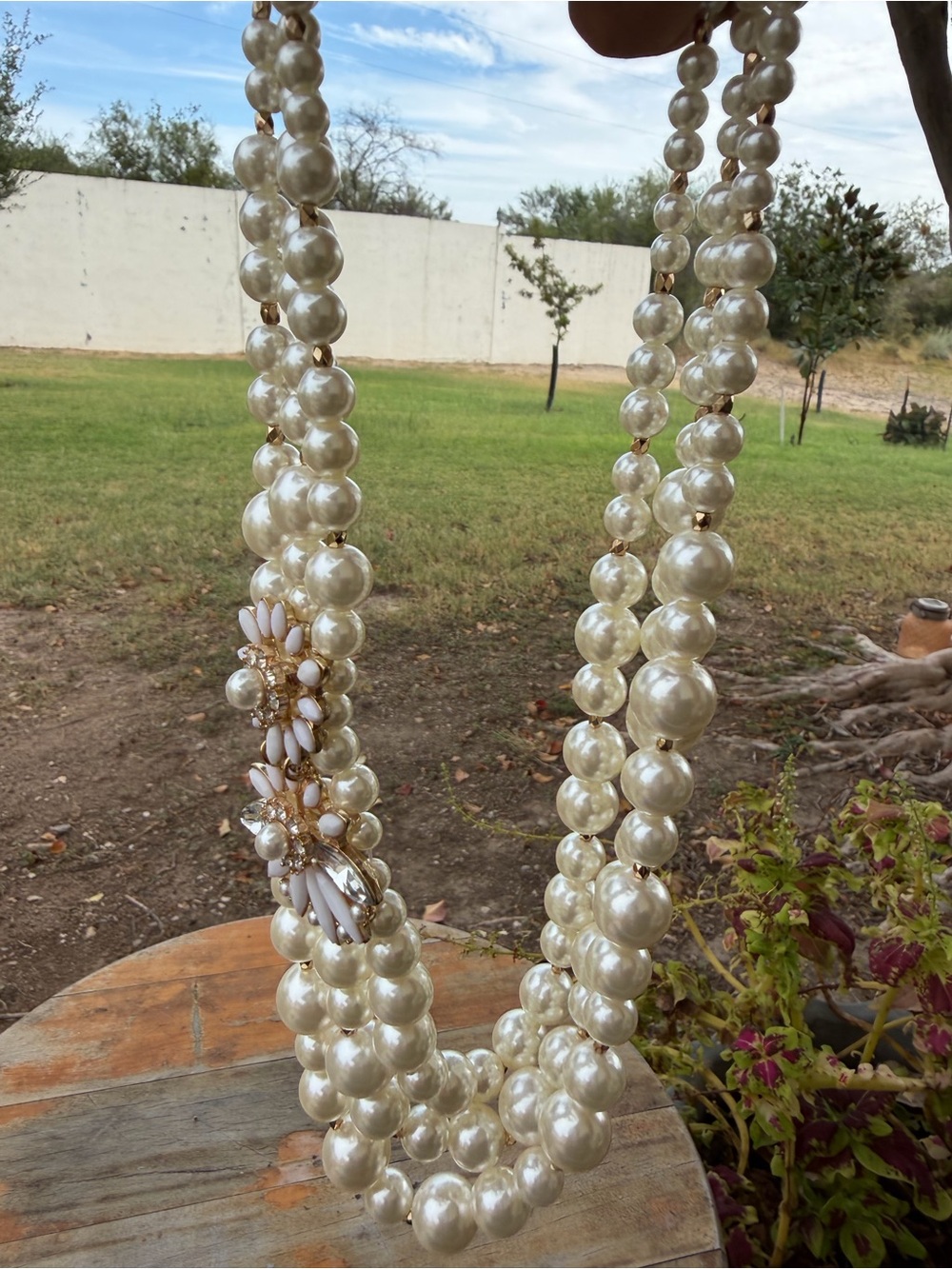 Multi Strand Faux Pearl Statement Necklace | Floral Crystal Brooch Detail - Picture 3 of 4